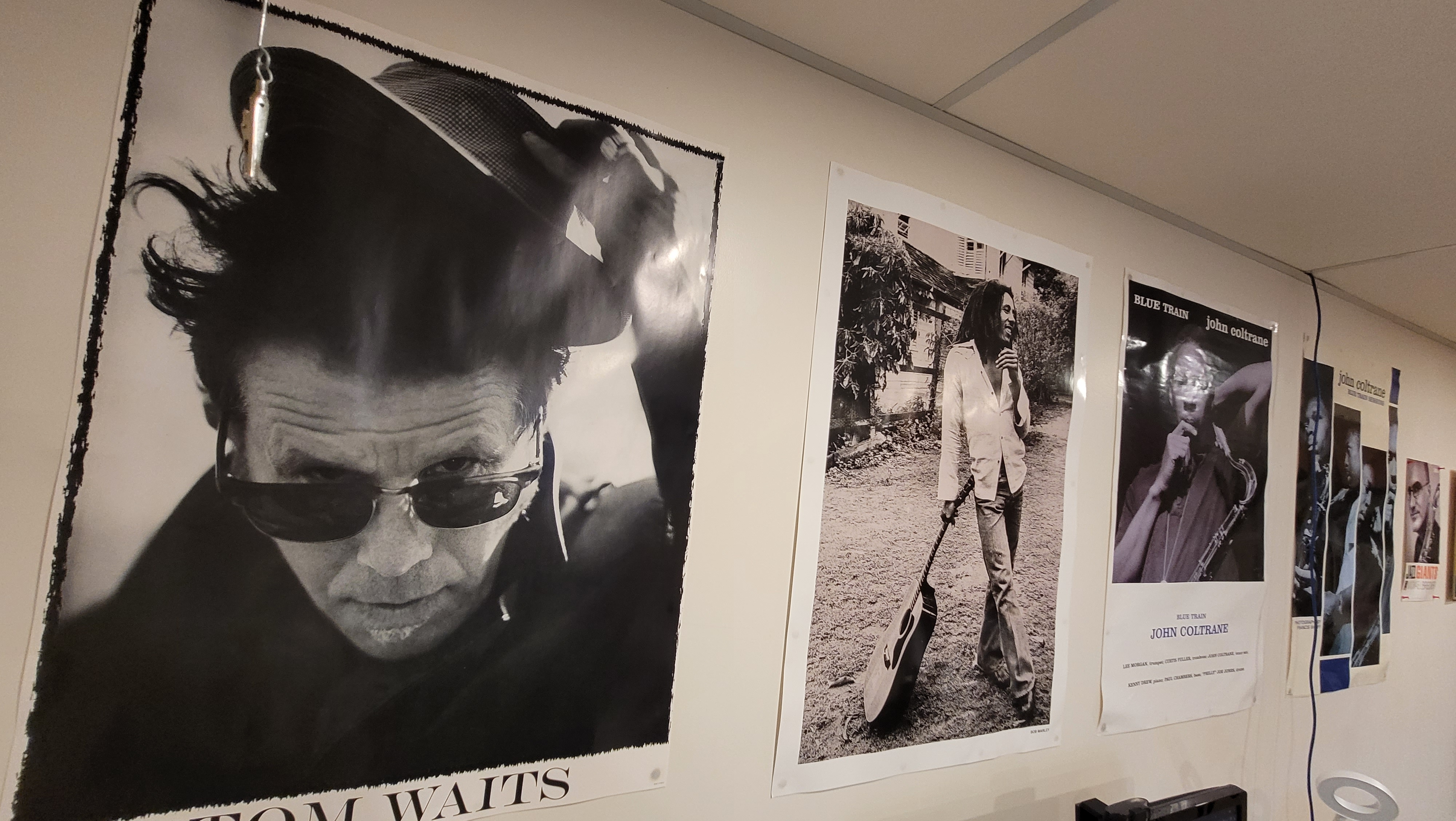 Posters of Tom Waits, Bob Marley, John Coltrane, Michael Brecker, James Brown